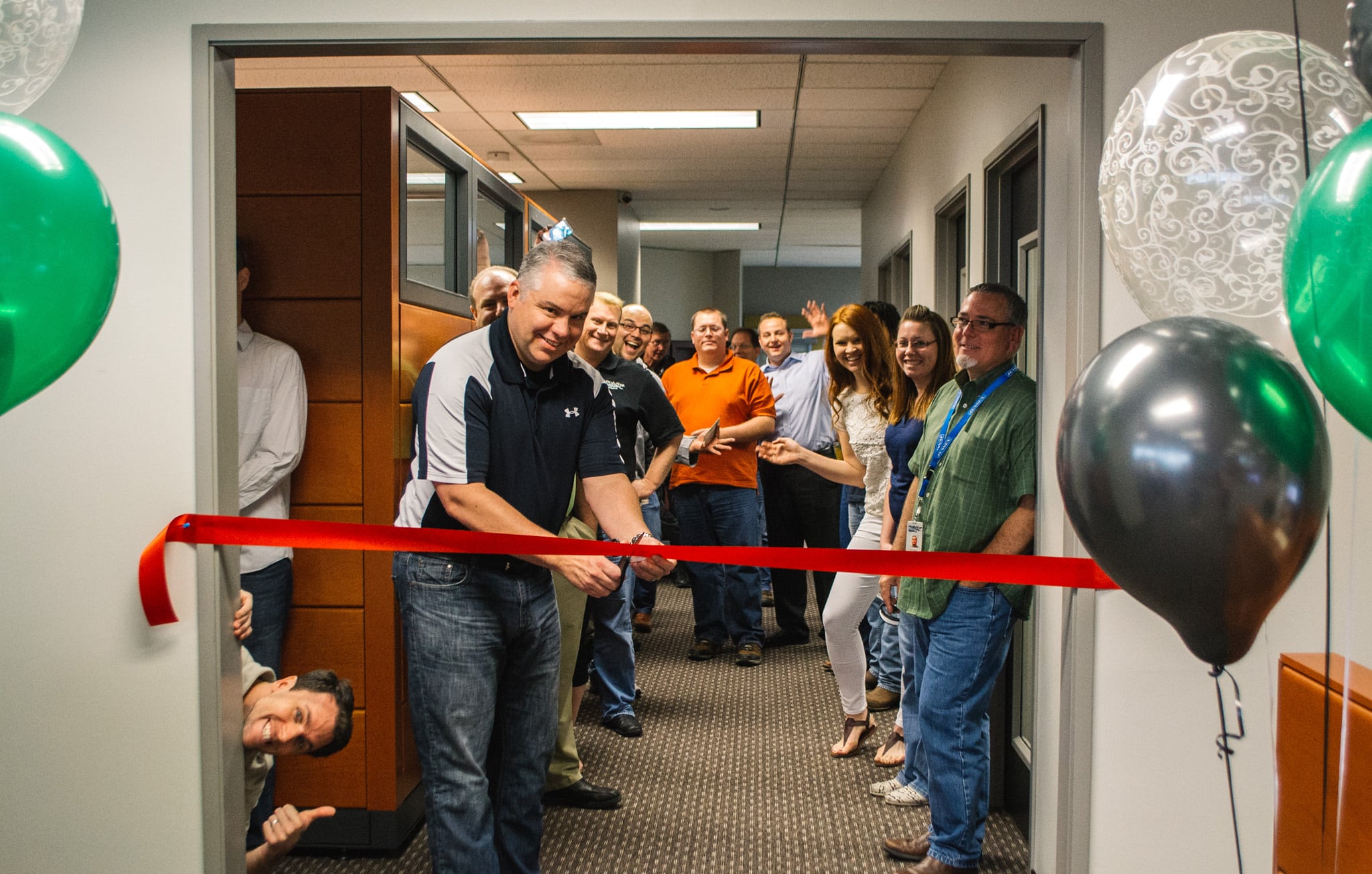 Point of Rental Software cuts ribbon to reveal our new space and growth