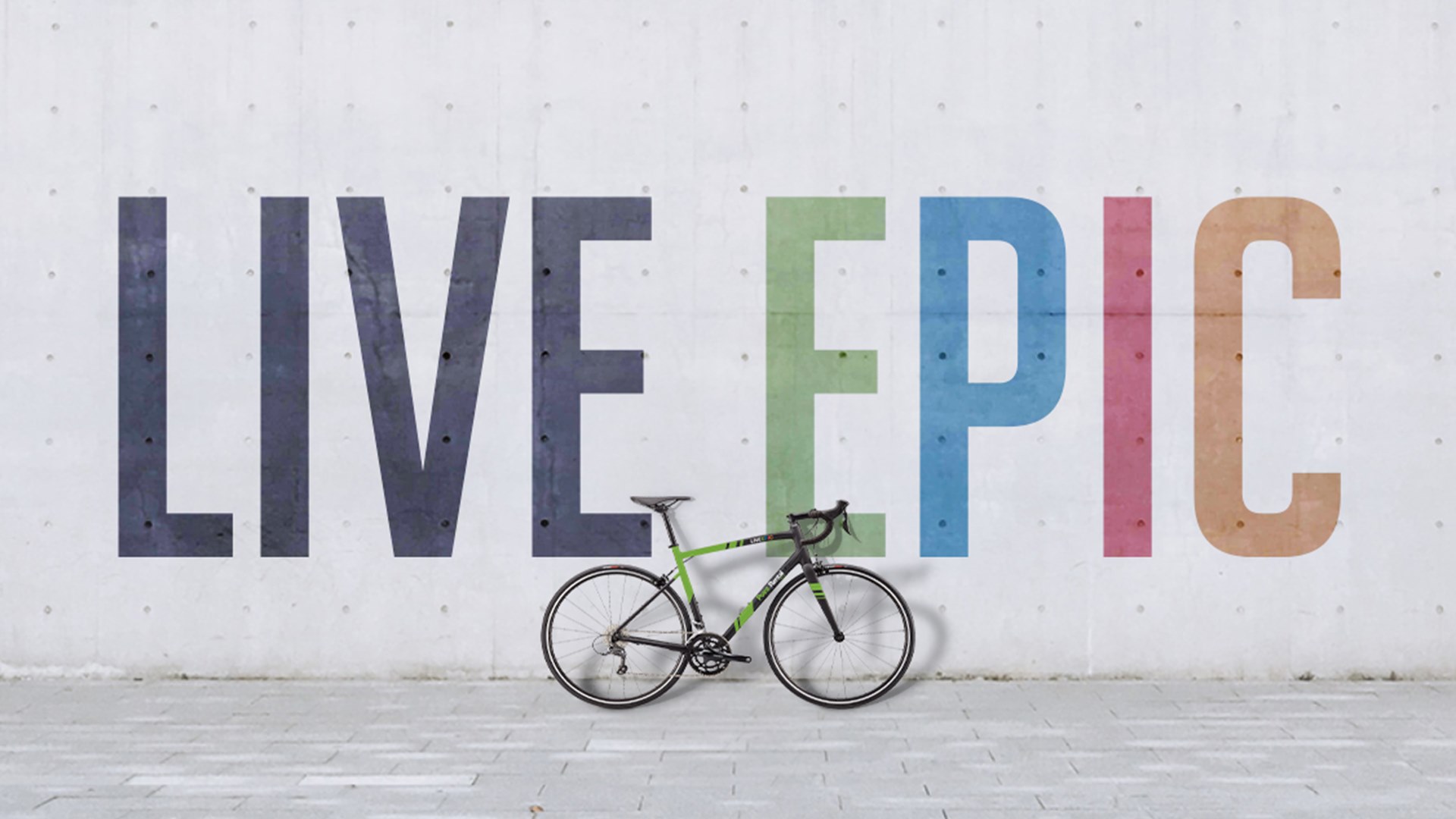 Live EPIC bike against a wall.