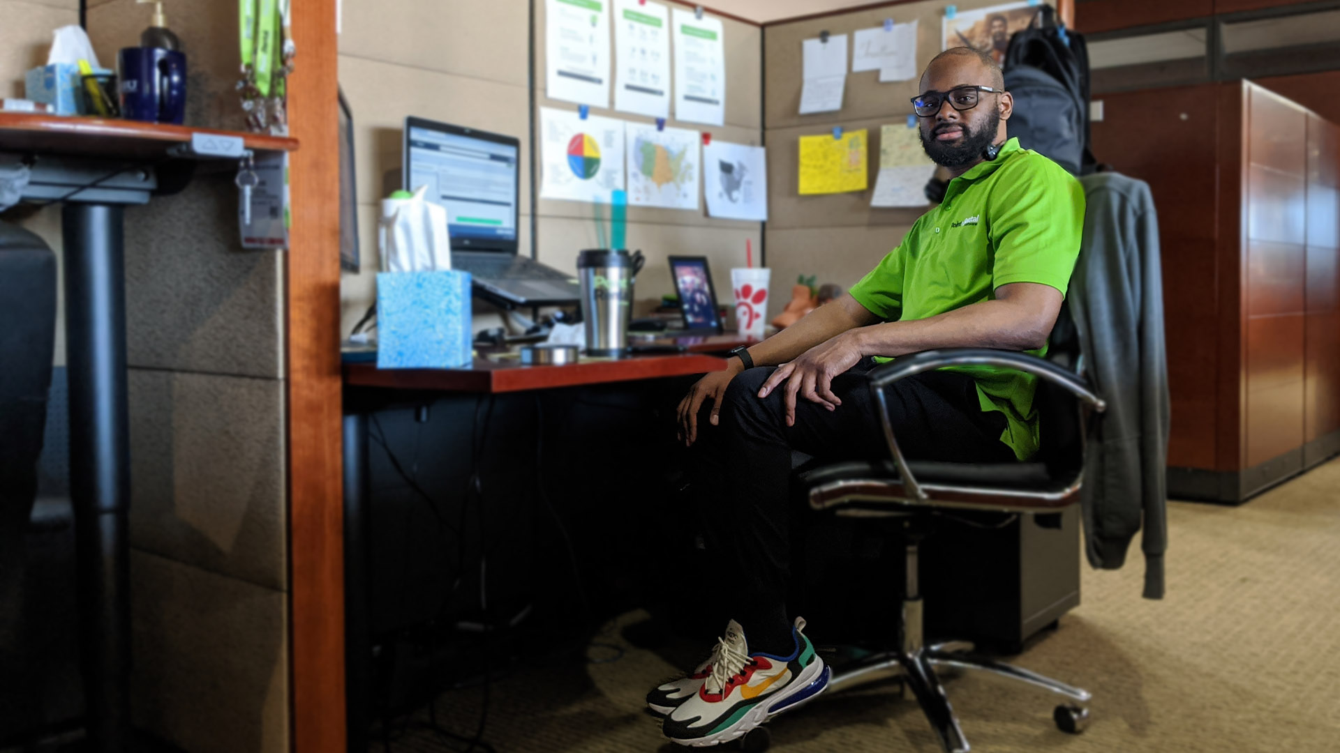 Jonathan Ingram sits at his desk.