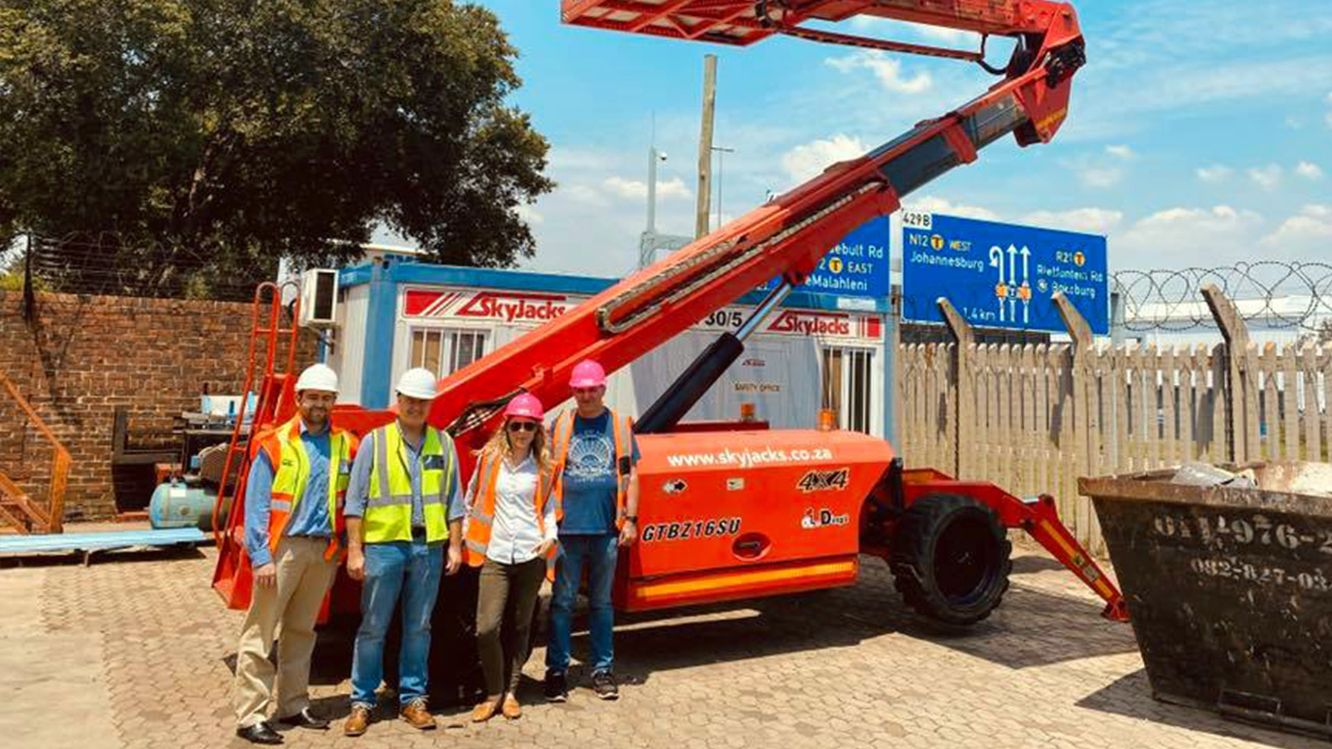 Point of Rental and SkyJacks personnel hang out on site at Skyjacks.