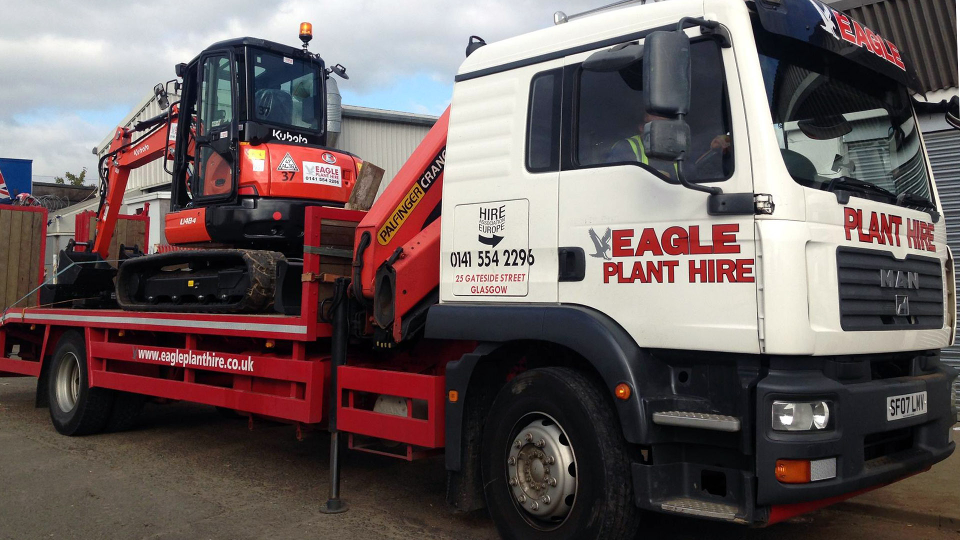An Eagle Plant Hire truck/trailer is loaded and ready to deliver.