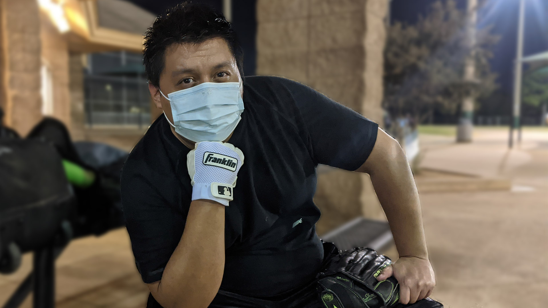 Dante Ramos-Delgado poses for a photo at the softball fields.