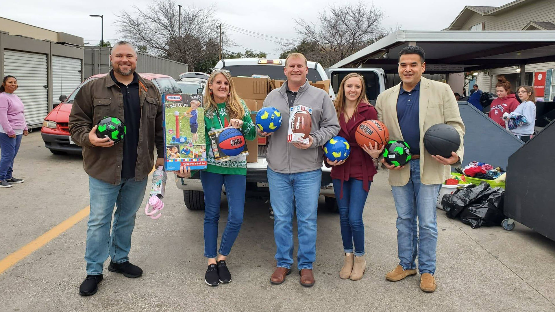 Mark Jordan and other Pointers pose while delivering the toys from Point the Way's 2019 toy drive.
