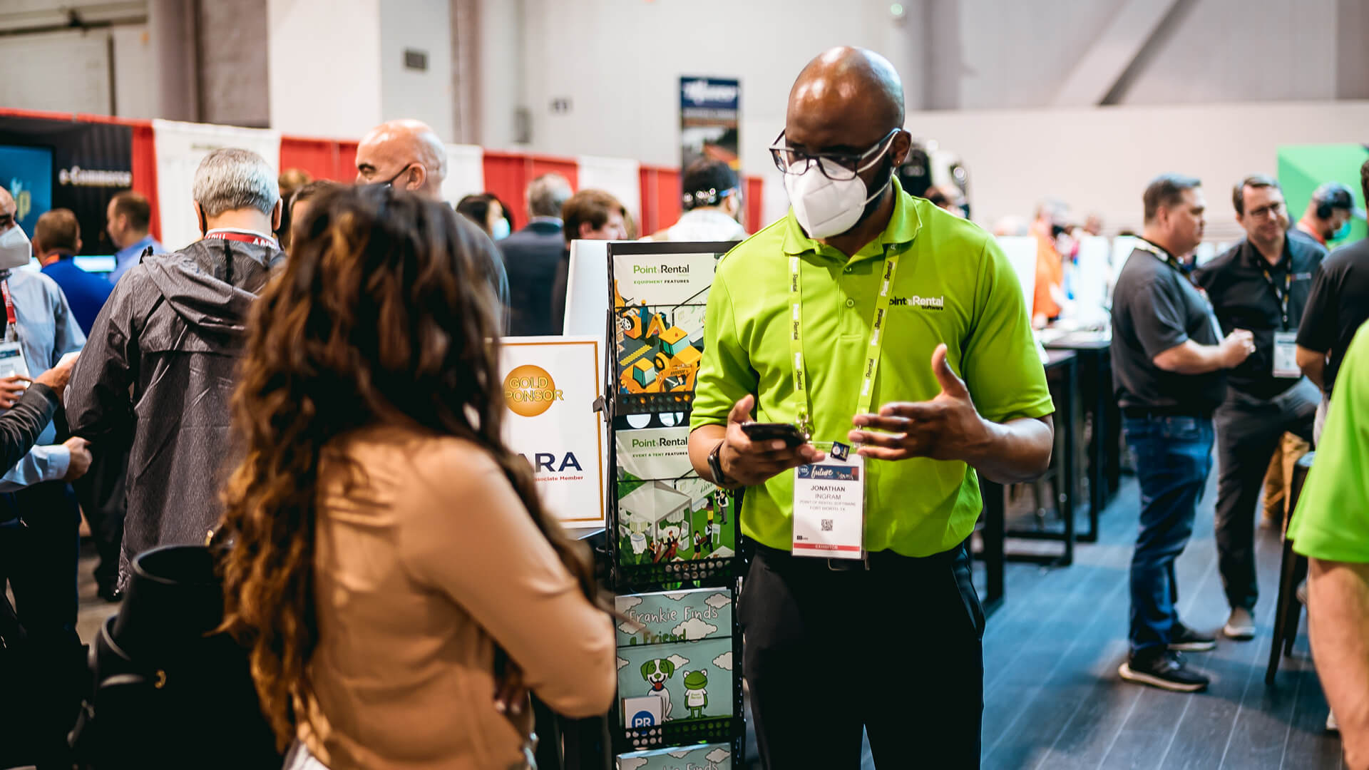 2021 Trade Show season looked a little different, as Jonathan, our masked SDR, talks to a visitor to the POR booth