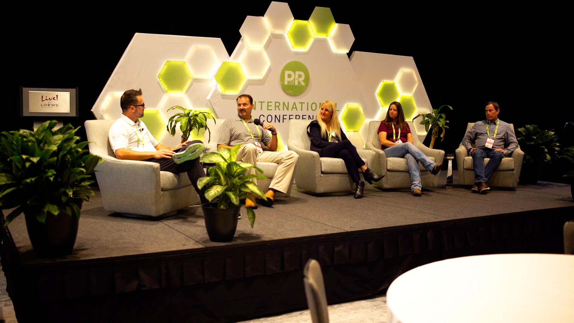 The PORIC22 Industry Panel onstage at the International Conference in 2022.