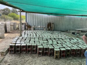 Hundreds of bricks made by Point of Rental's South Africa team and partners for Door of Hope.