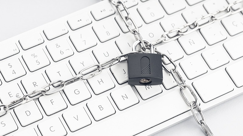 Chain and lock securing a keyboard.