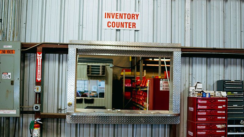 An inventory counter within a rental store.