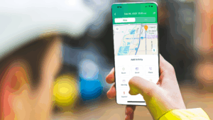 A cell phone in the hand of a person on a job site. A RepMove dashboard is displayed on-screen.