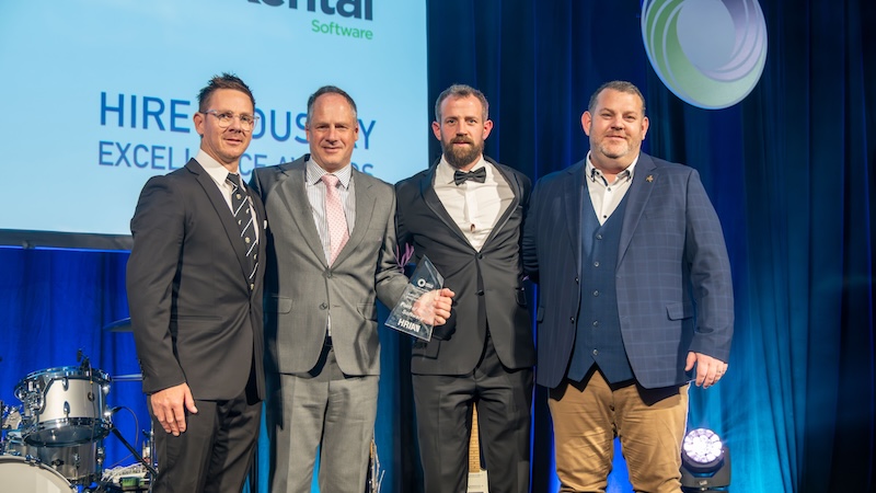 RPM Hire CEO Ash Woodcock and Pointers Josh O'Connell, Dave Cameron, and Mark Whiteman on stage celebrating RPM Hire's Hire Company of the Year win in 2025.